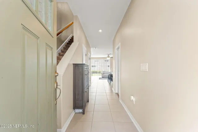a view of a hallway with a white walls