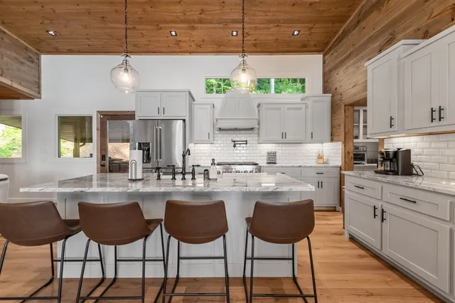 a kitchen with a sink and a window