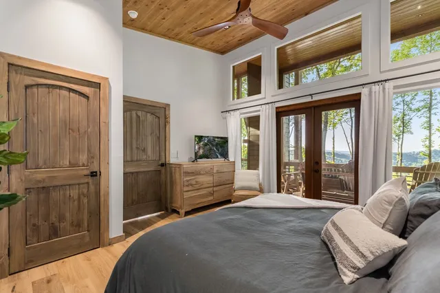 a spacious bathroom with a tub and sink