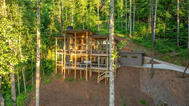 a outdoor living space with furniture and a fireplace