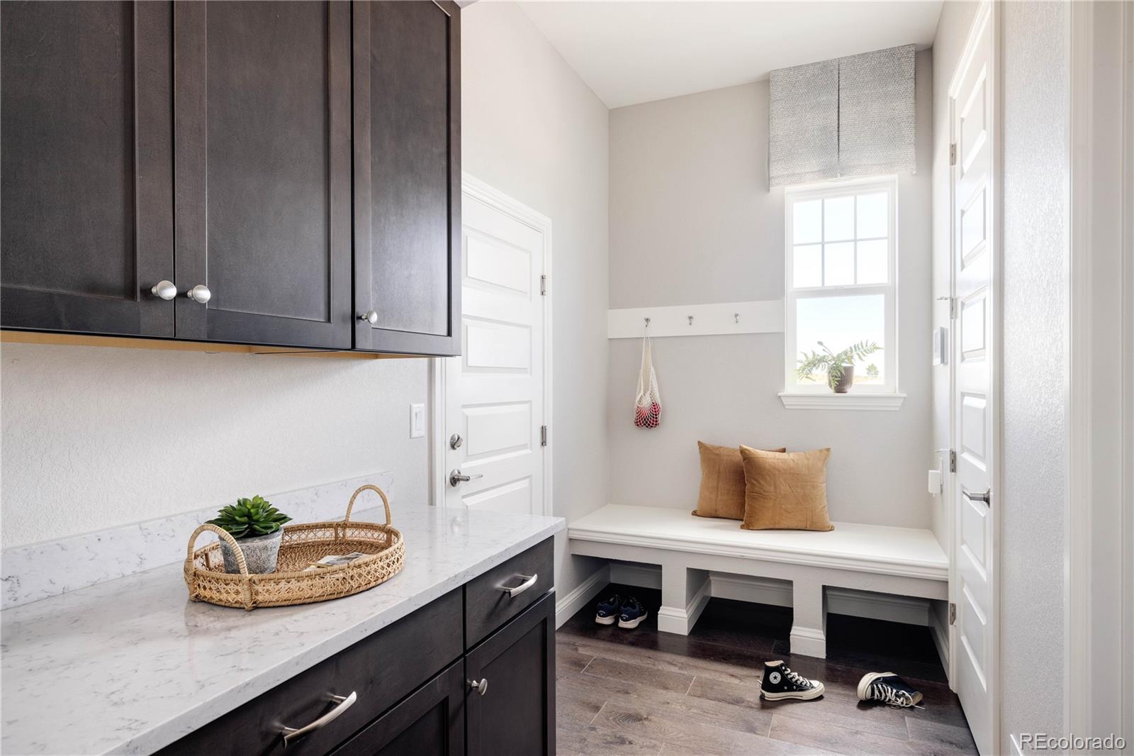 3966 Breakcamp Court Castle Rock, CO 80108 - Photo 18 of 46 a room with a window and cabinets