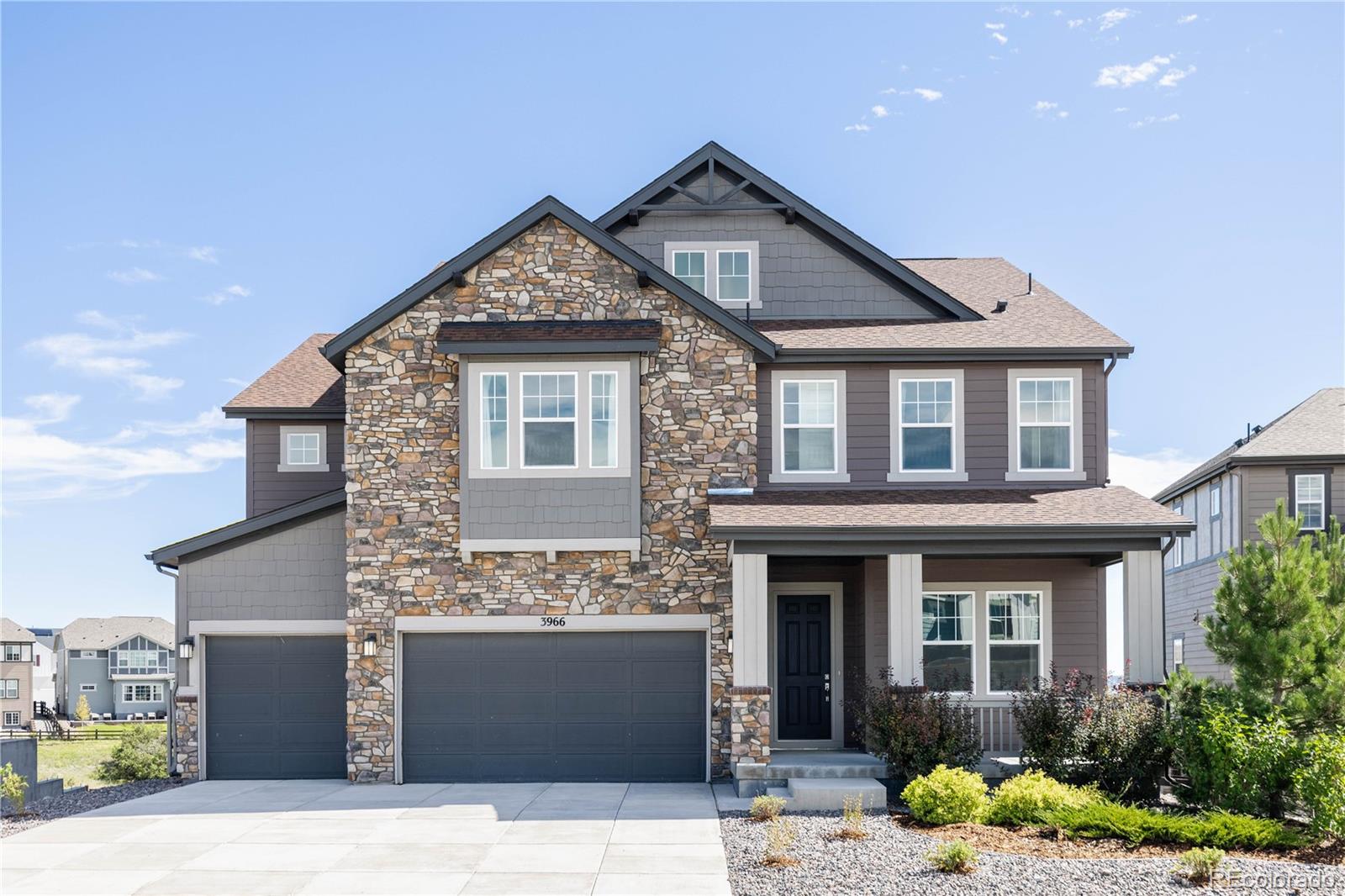 3966 Breakcamp Court Castle Rock, CO 80108 - Photo 2 of 46 a front view of a house with a yard