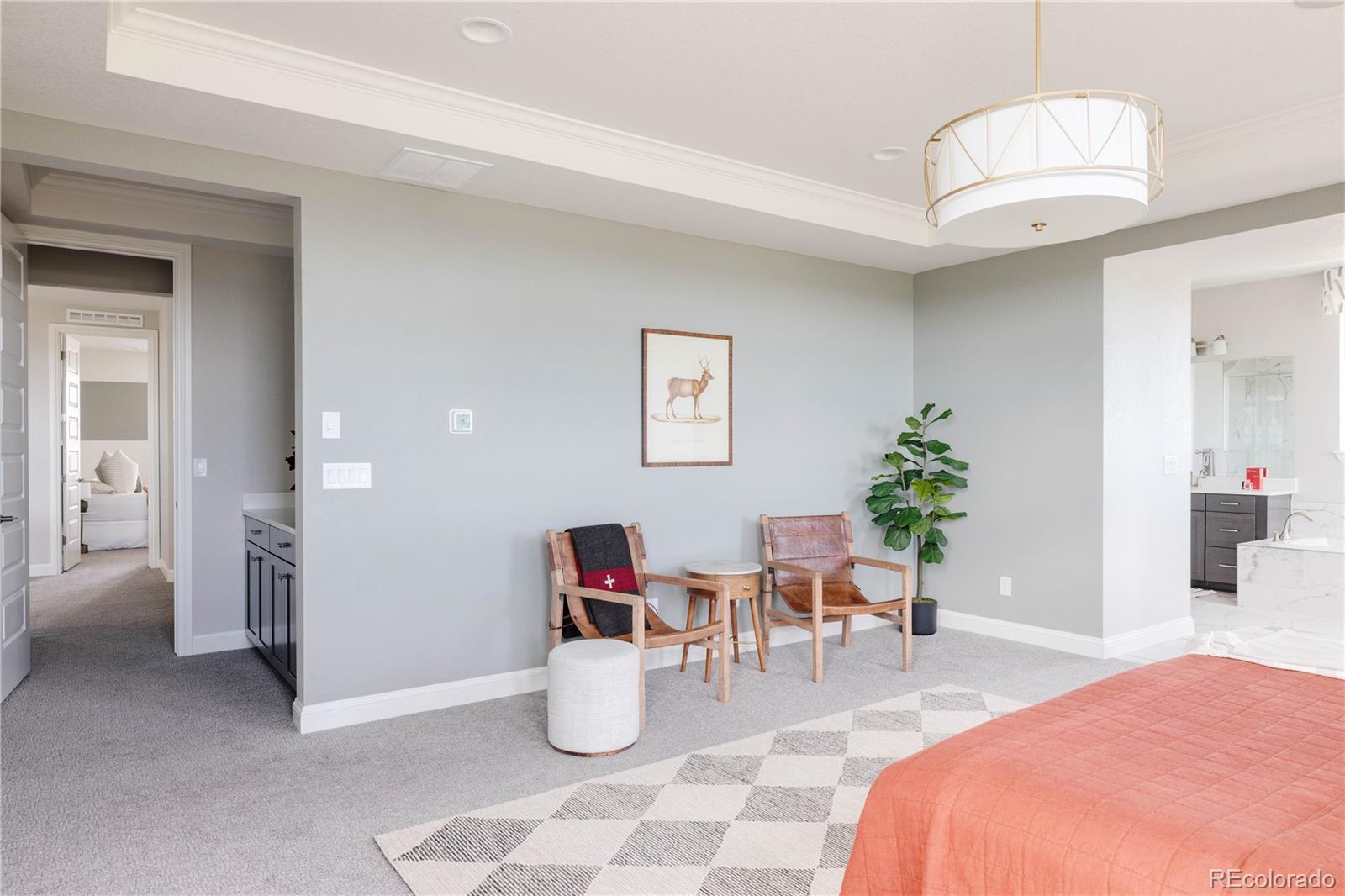 3966 Breakcamp Court Castle Rock, CO 80108 - Photo 23 of 46 a living room with furniture a dining table and chairs with kitchen view