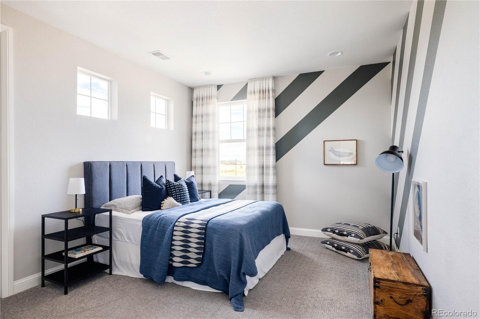 3966 Breakcamp Court Castle Rock, CO 80108 - Photo 27 of 46 a bed room with a bed and a window