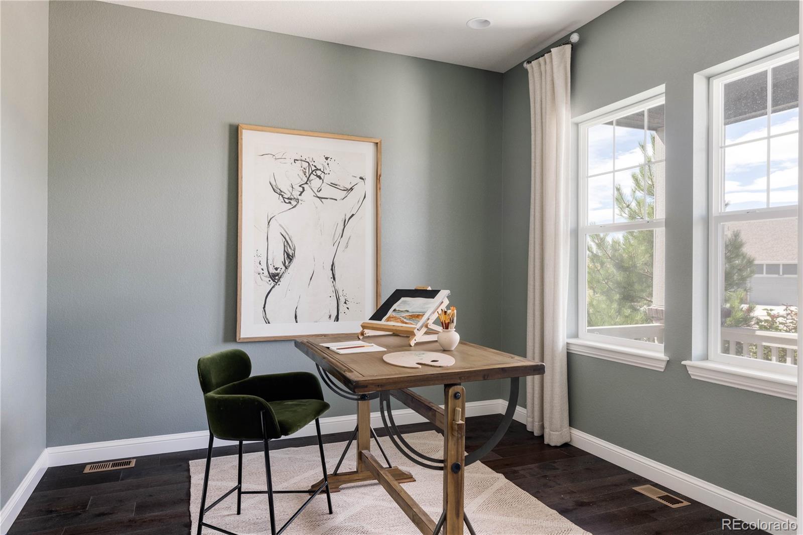 3966 Breakcamp Court Castle Rock, CO 80108 - Photo 4 of 46 a dining room with furniture and window