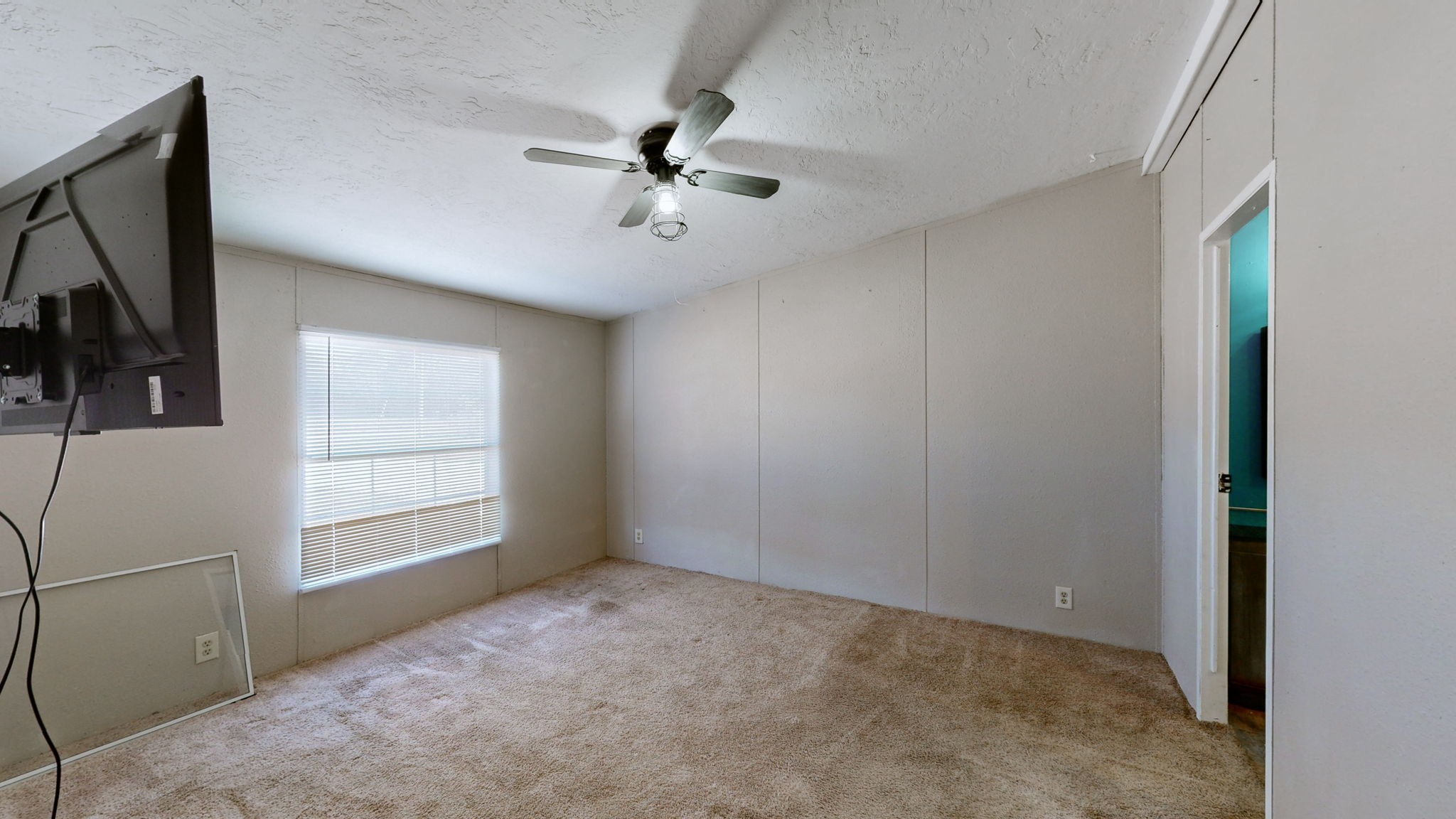574 Benson Road Manchester, TN 37355 - Photo 13 of 41 a view of empty room with window and ceiling fan