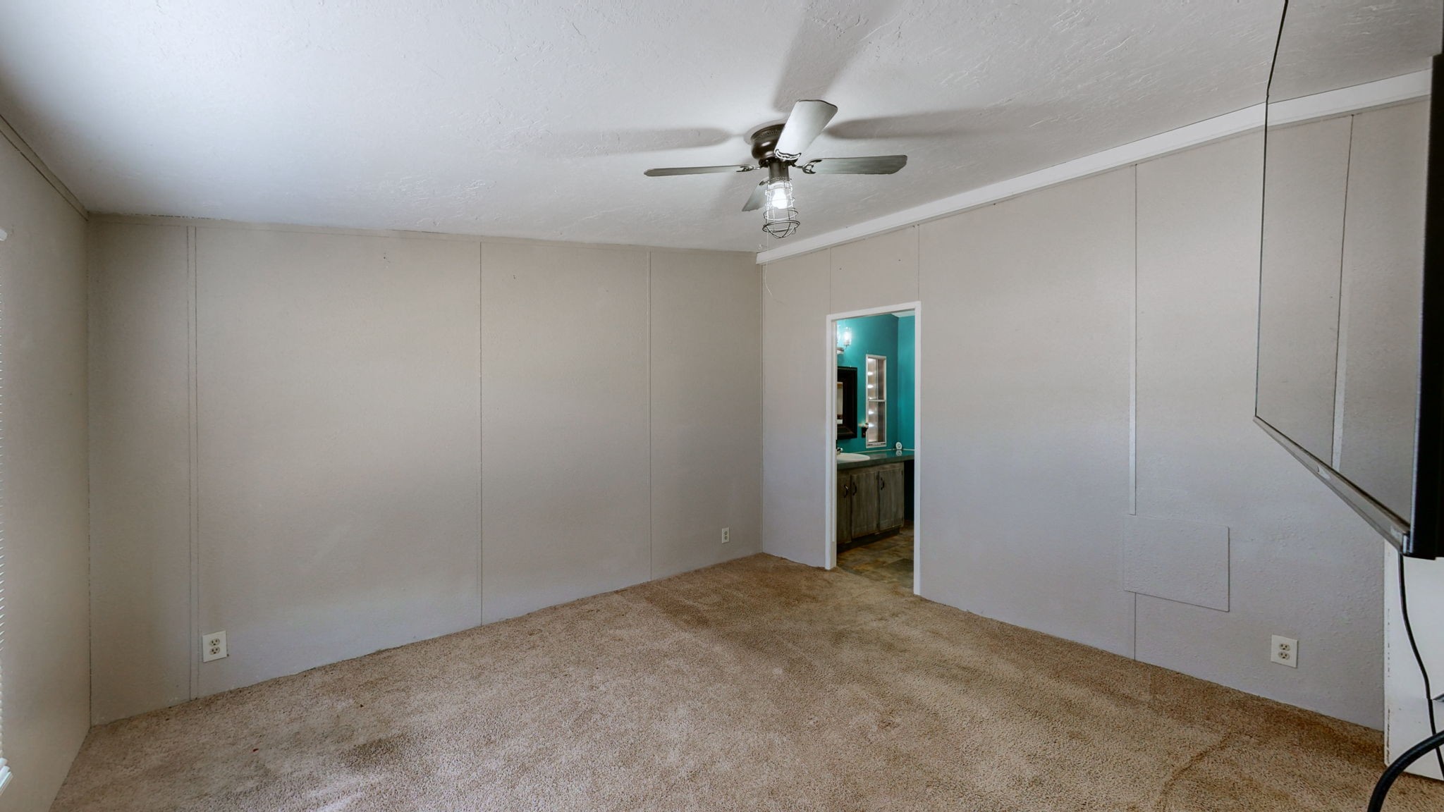 574 Benson Road Manchester, TN 37355 - Photo 17 of 41 a view of an empty room with a fan