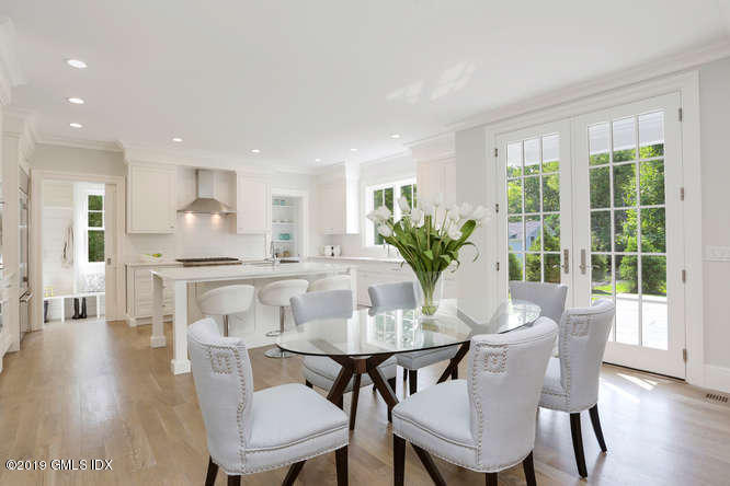 62 Lockwood Road Riverside, CT 06878 - Photo 3 of 18 a view of a dining room with furniture and wooden floor