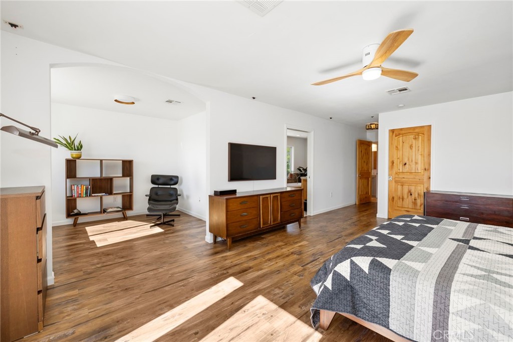 35607 Red Rover Mine Road Acton, CA 93510 - Photo 15 of 42 a bedroom with furniture and a flat screen tv