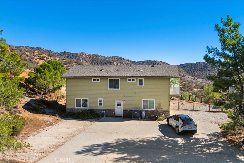 35607 Red Rover Mine Road Acton, CA 93510 - Photo 2 of 42 a front view of a house with a yard