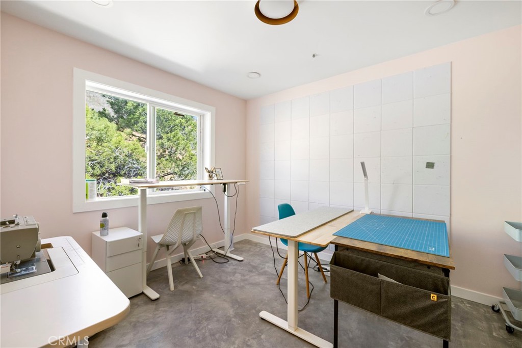 35607 Red Rover Mine Road Acton, CA 93510 - Photo 25 of 42 a work room with furniture and a window