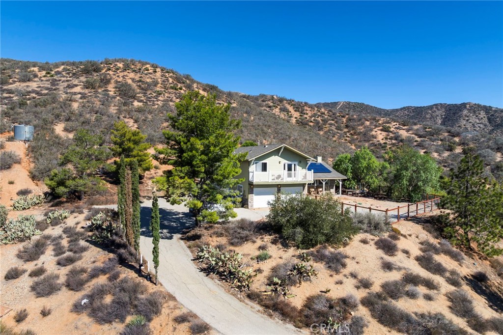 35607 Red Rover Mine Road Acton, CA 93510 - Photo 4 of 42 a view of a house with a yard