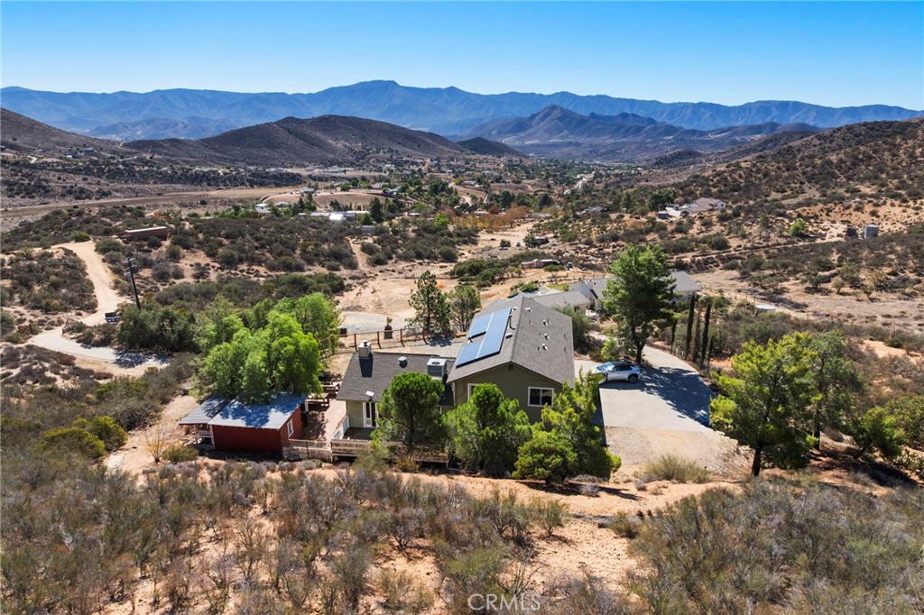 35607 Red Rover Mine Road Acton, CA 93510 - Photo 41 of 42 a view of a lush green hillside and houses