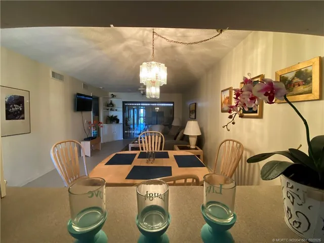 a bedroom with a bed and a dresser in it