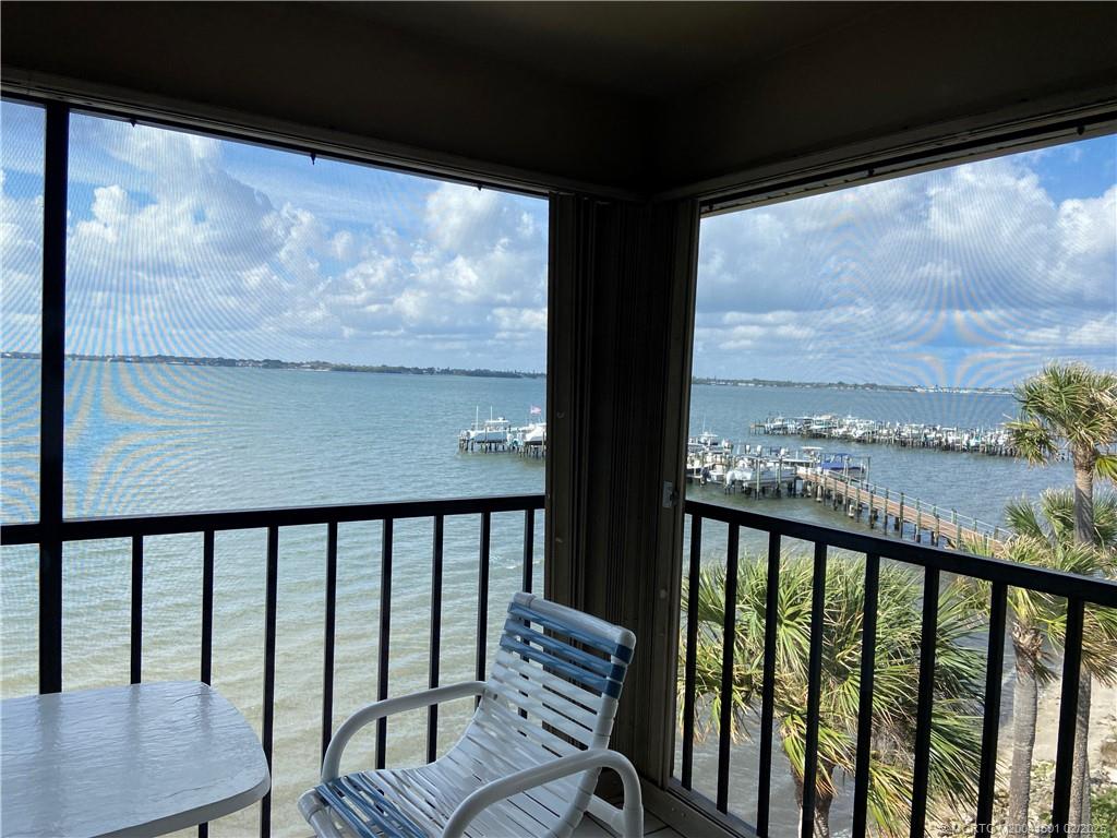 4620 Northeast Sandpebble Trace, Unit 405 Stuart, FL 34996 - Photo 4 of 26 a view of a city from a balcony