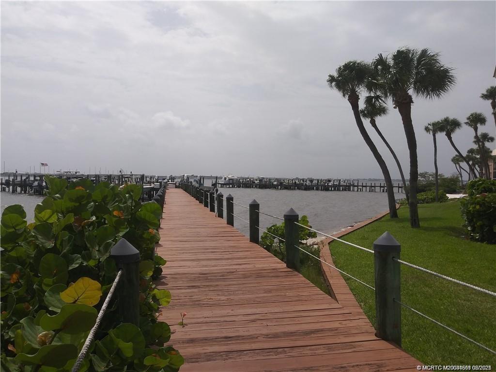 4620 Northeast Sandpebble Trace, Unit 405 Stuart, FL 34996 - Photo 10 of 26 a view of a lake and outdoor space