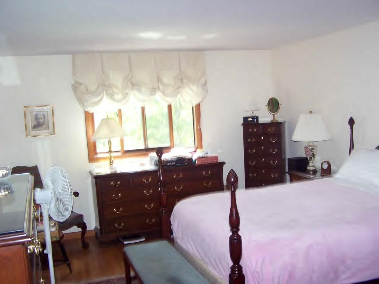 135 Rathbun Road Hancock, MA 01267 - Photo 11 of 15 a bedroom with a bed and window