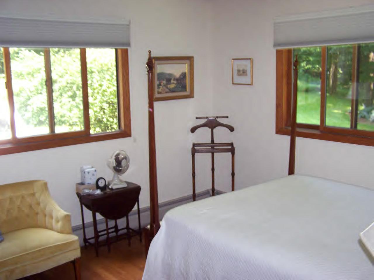135 Rathbun Road Hancock, MA 01267 - Photo 12 of 15 a bedroom with a bed and a window