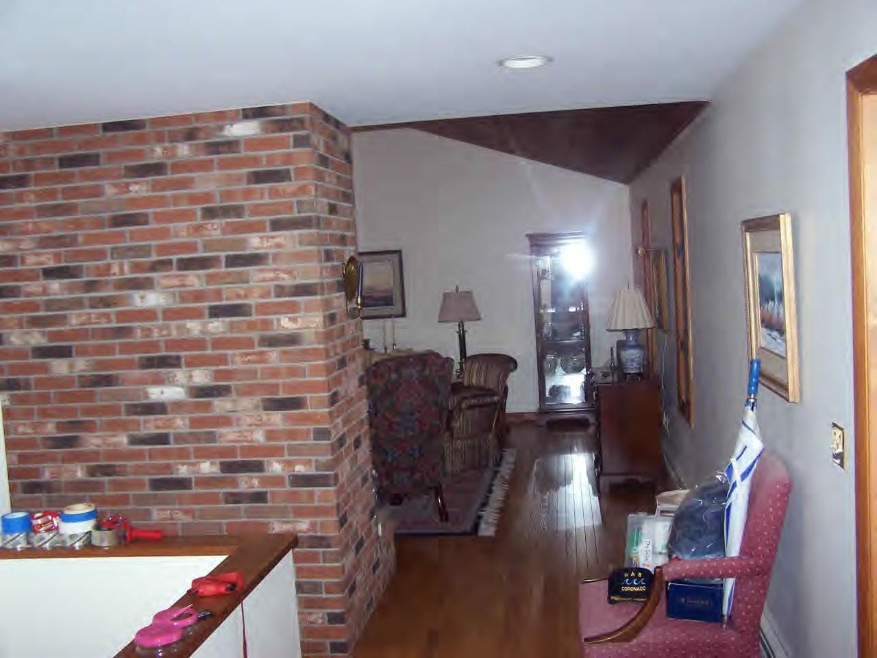 135 Rathbun Road Hancock, MA 01267 - Photo 5 of 15 a hallway with couches and wooden floor