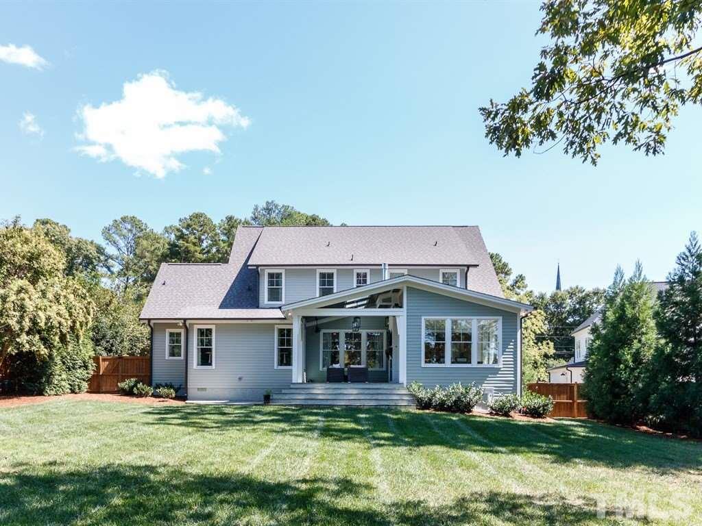 5015 Langley Circle Raleigh, NC 27609 - Photo 2 of 25 a front view of a house with a garden