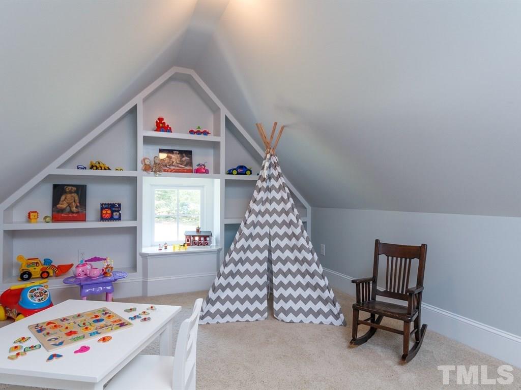 5015 Langley Circle Raleigh, NC 27609 - Photo 21 of 25 a room with toys and a dresser