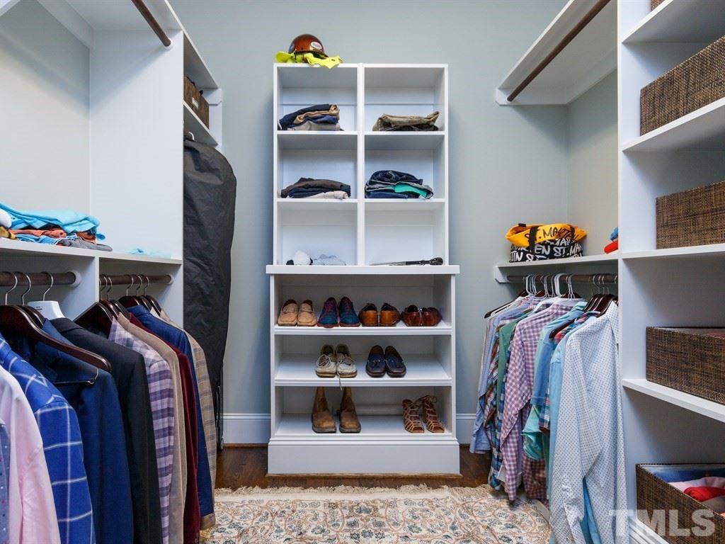 5015 Langley Circle Raleigh, NC 27609 - Photo 10 of 25 a view of walk in closet with clothes and shoes
