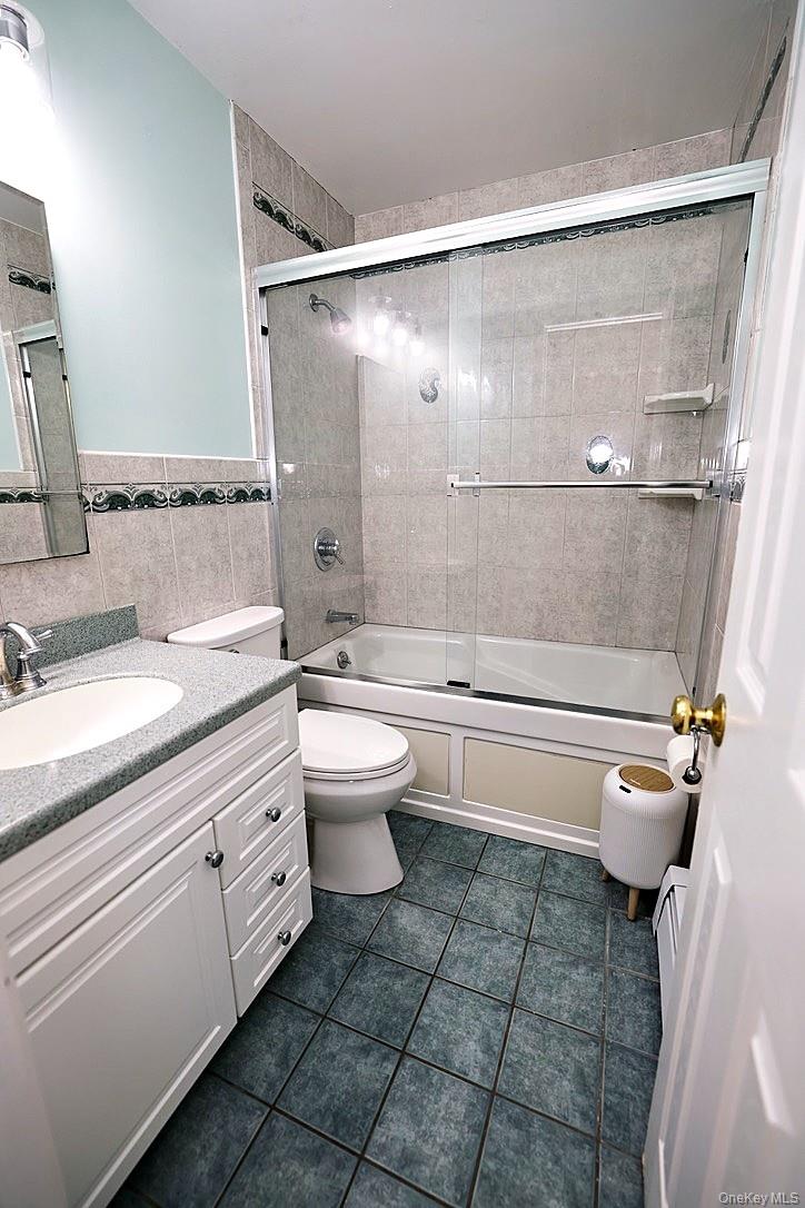 28 Jacobs Road Thiells, NY 10984 - Photo 12 of 29 a bathroom with a sink a toilet and shower