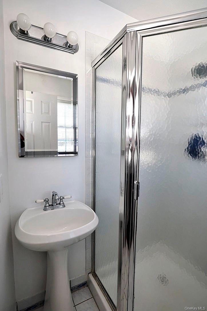 28 Jacobs Road Thiells, NY 10984 - Photo 16 of 29 a bathroom with a sink and mirror