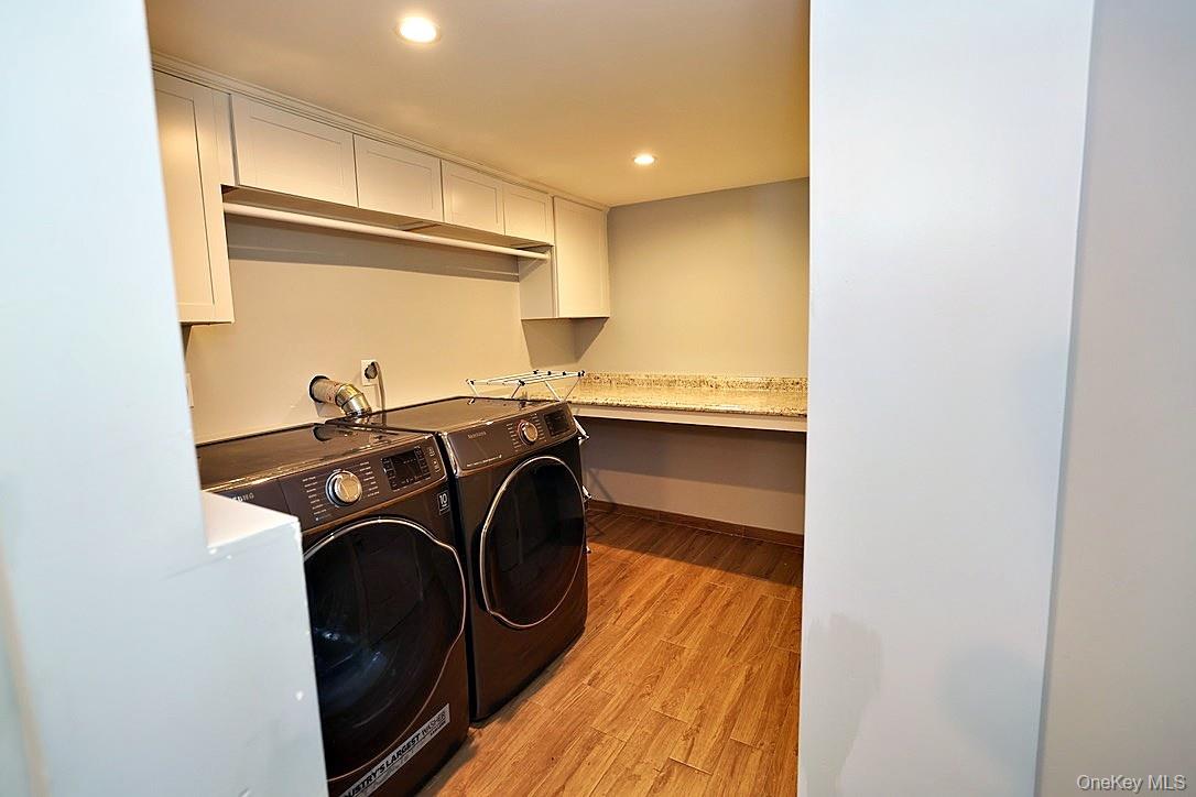 28 Jacobs Road Thiells, NY 10984 - Photo 22 of 29 a utility room with sink dryer and washer