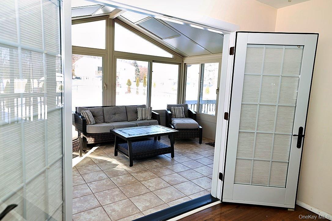 28 Jacobs Road Thiells, NY 10984 - Photo 7 of 29 a living room with a large window