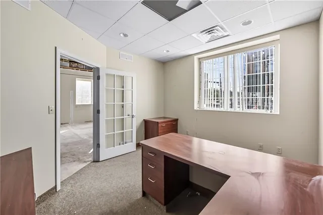 a view of a building with a street