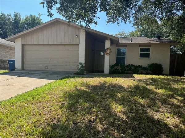 a front view of house with yard