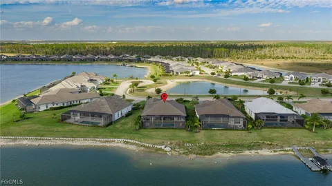 a aerial view of a house with a ocean view