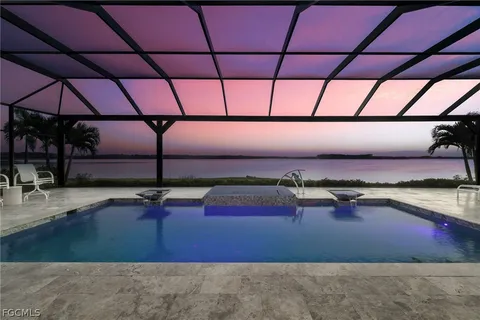 a room with pool table and table