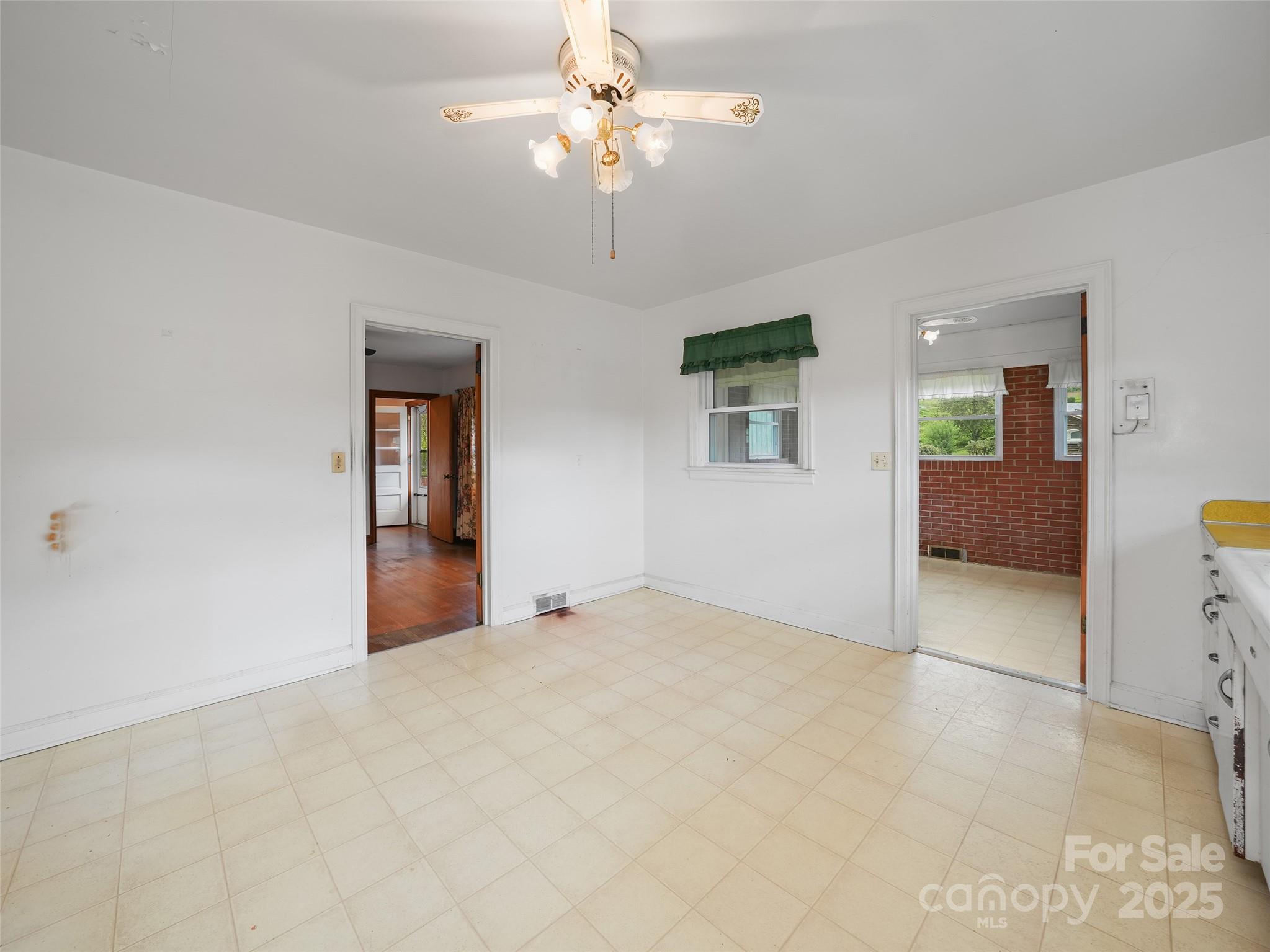 5 Noland Downs Road Waynesville, NC 28785 - Photo 12 of 33 a view of an empty room with a bathroom