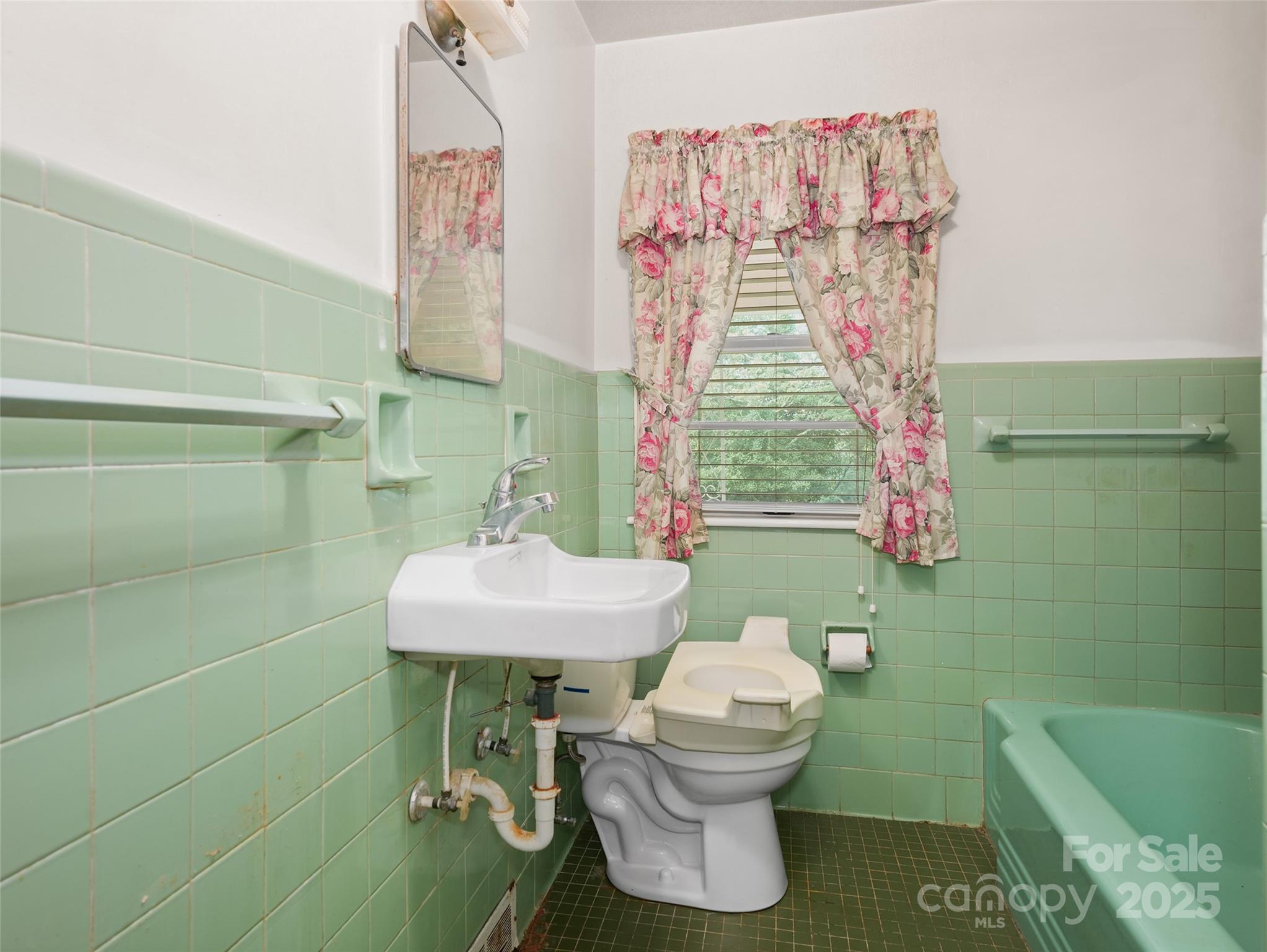 5 Noland Downs Road Waynesville, NC 28785 - Photo 15 of 33 a bathroom with a sink toilet and a shower