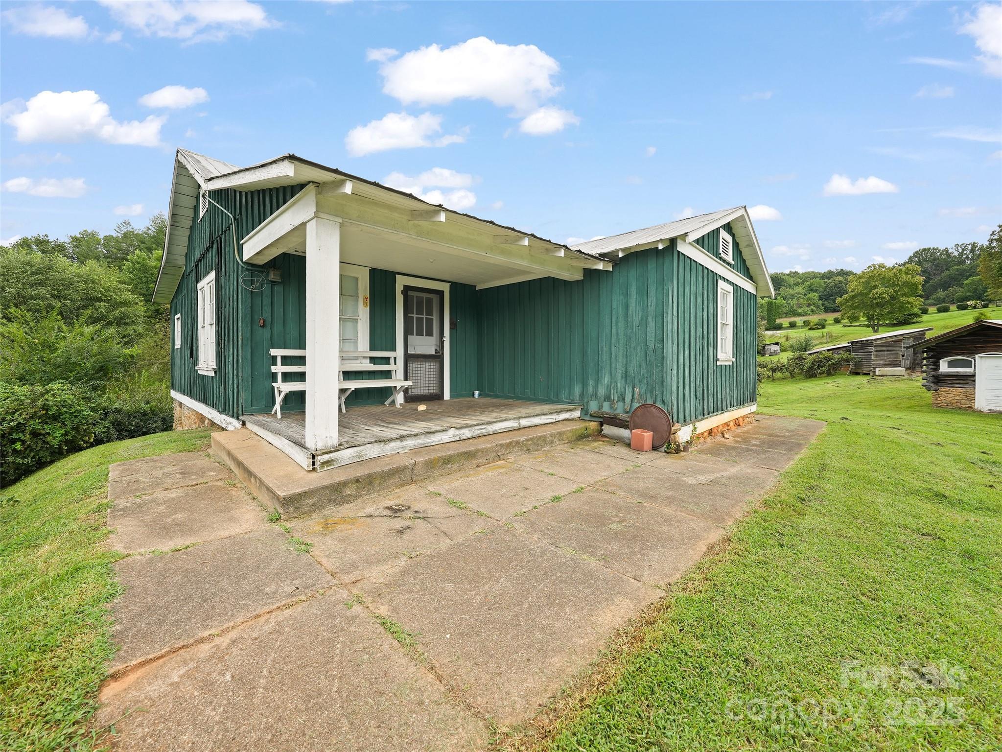 5 Noland Downs Road Waynesville, NC 28785 - Photo 23 of 33 a view of a house with a yard