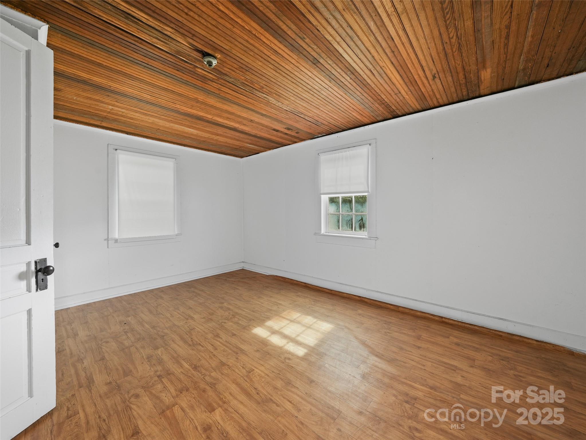 5 Noland Downs Road Waynesville, NC 28785 - Photo 26 of 33 an empty room with windows