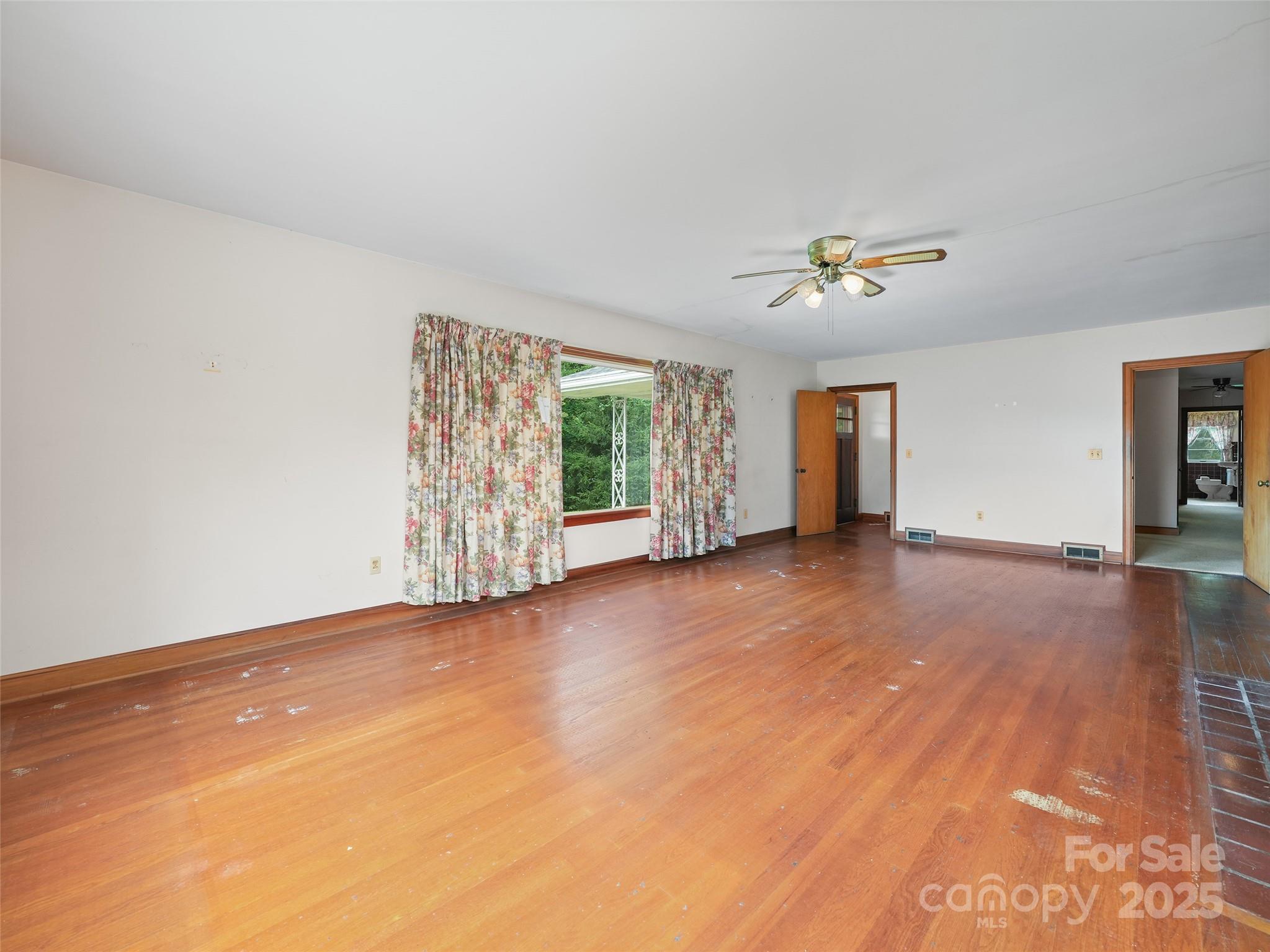 5 Noland Downs Road Waynesville, NC 28785 - Photo 6 of 33 a view of an empty room with a window