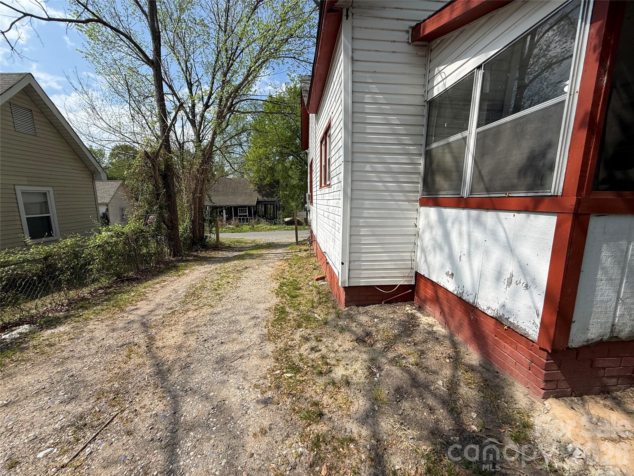 965 13th Street Lancaster, SC 29720 - Photo 6 of 17 a view of backyard with small cabin