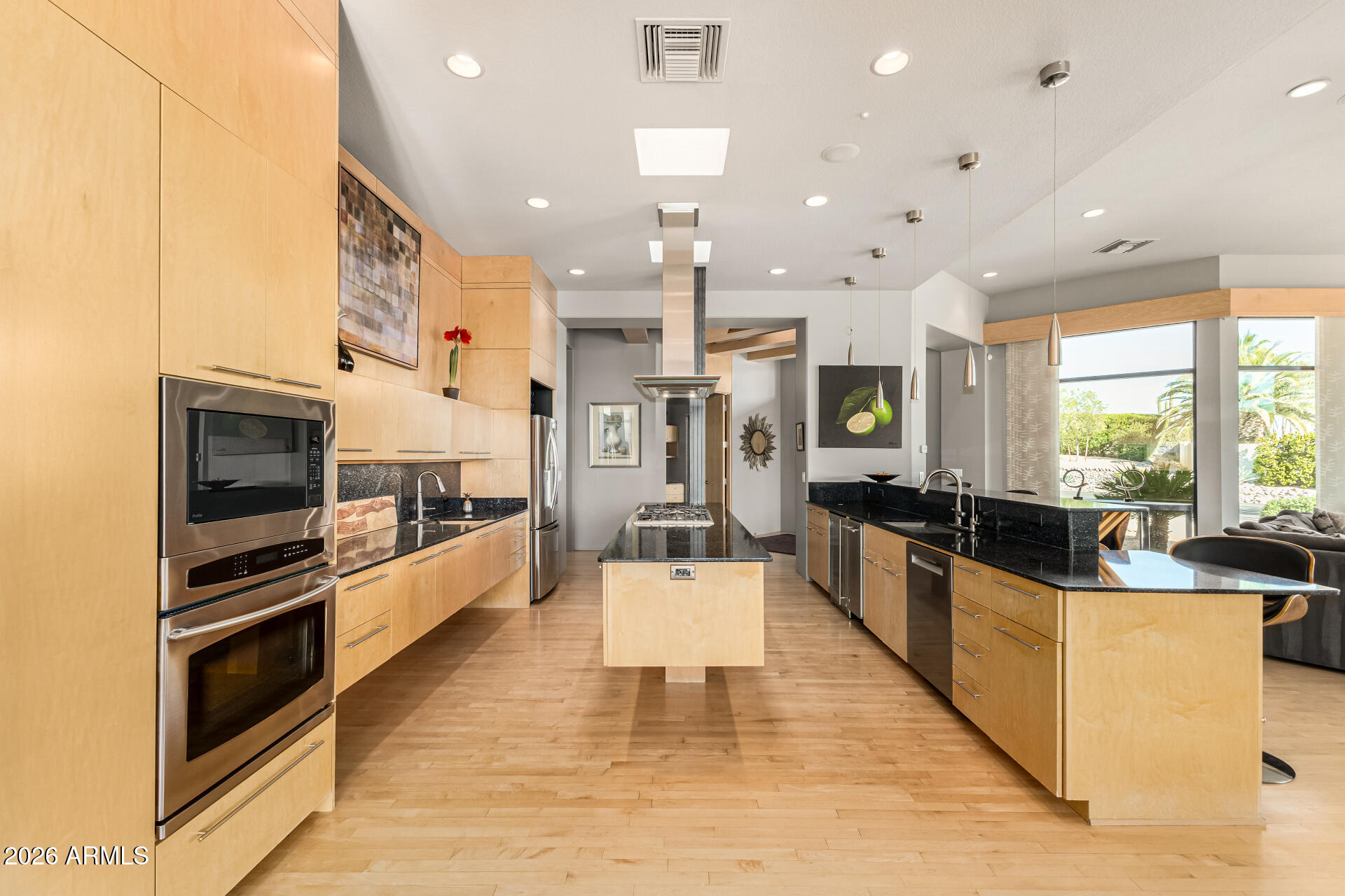 18567 East Paseo Verde Drive Rio Verde, AZ 85263 - Photo 13 of 47 a large white kitchen with stainless steel appliances