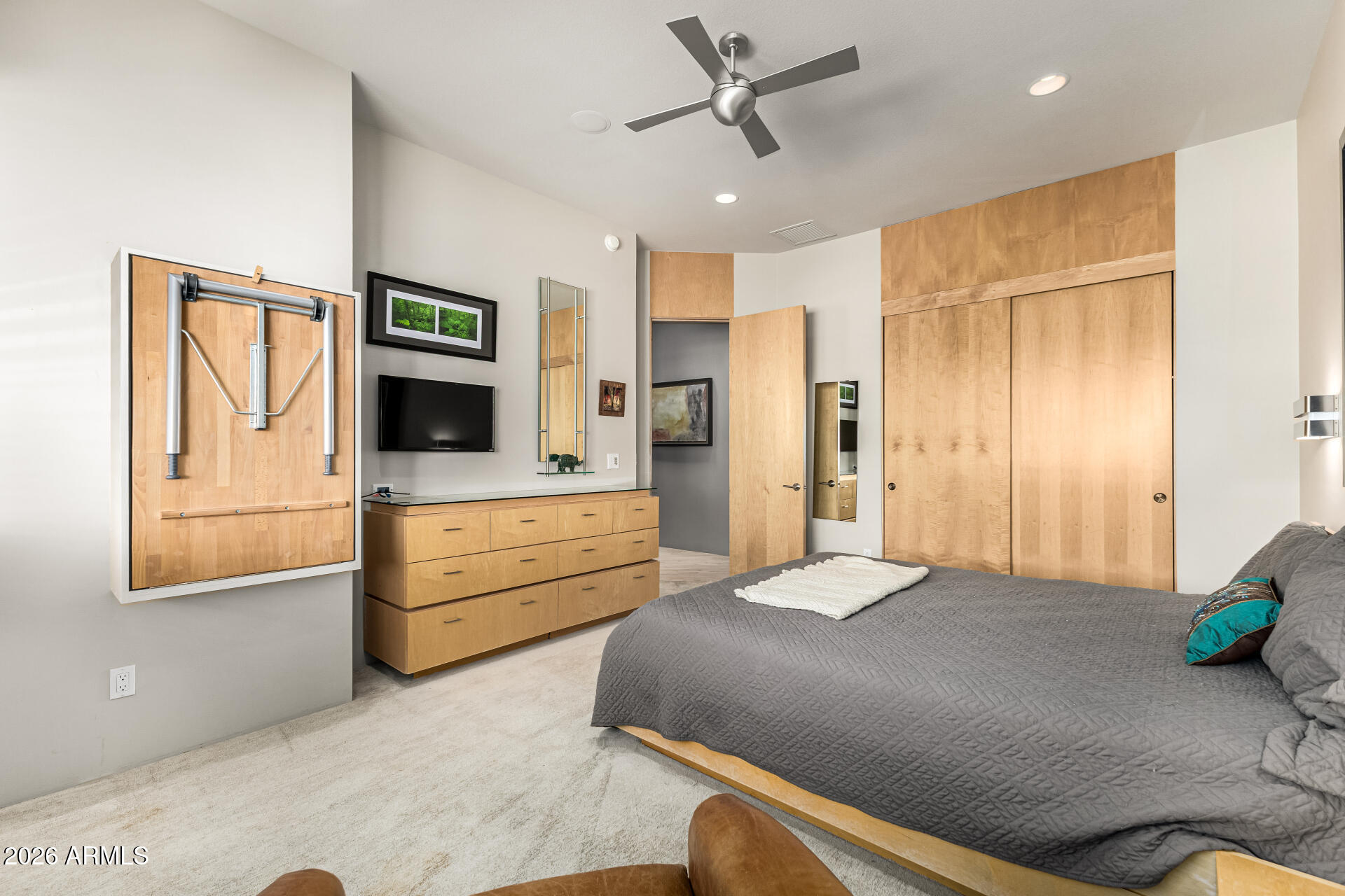 18567 East Paseo Verde Drive Rio Verde, AZ 85263 - Photo 26 of 47 a bedroom with a bed and ceiling fan