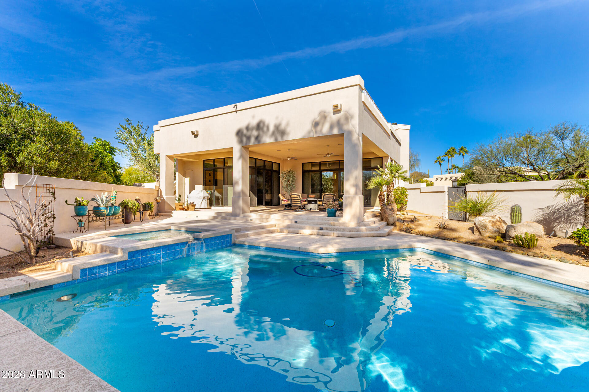 18567 East Paseo Verde Drive Rio Verde, AZ 85263 - Photo 34 of 47 a view of a swimming pool with outdoor seating