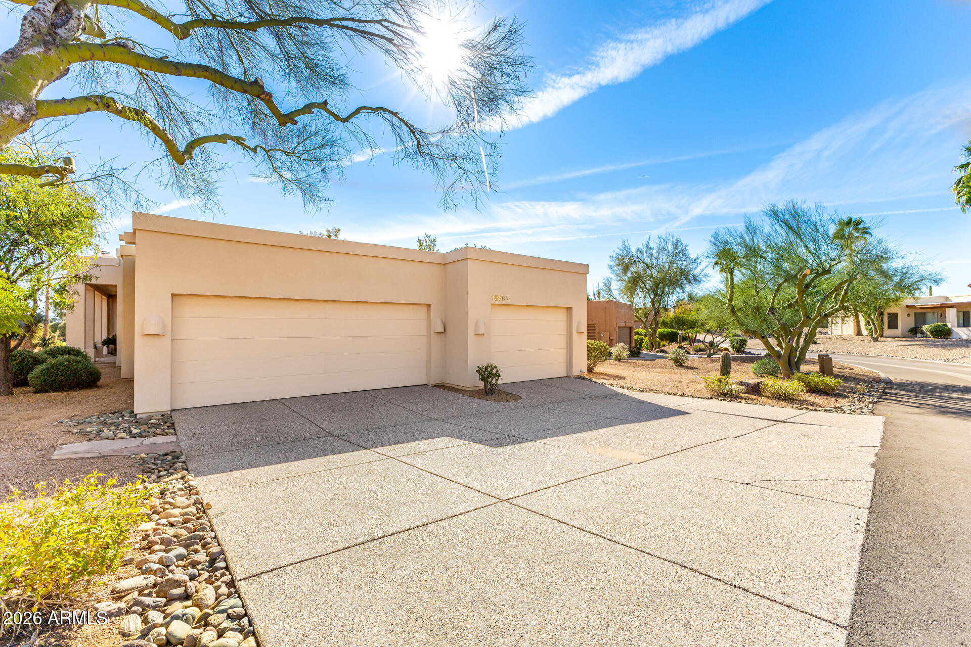 18567 East Paseo Verde Drive Rio Verde, AZ 85263 - Photo 4 of 47 a view of a backyard of a house