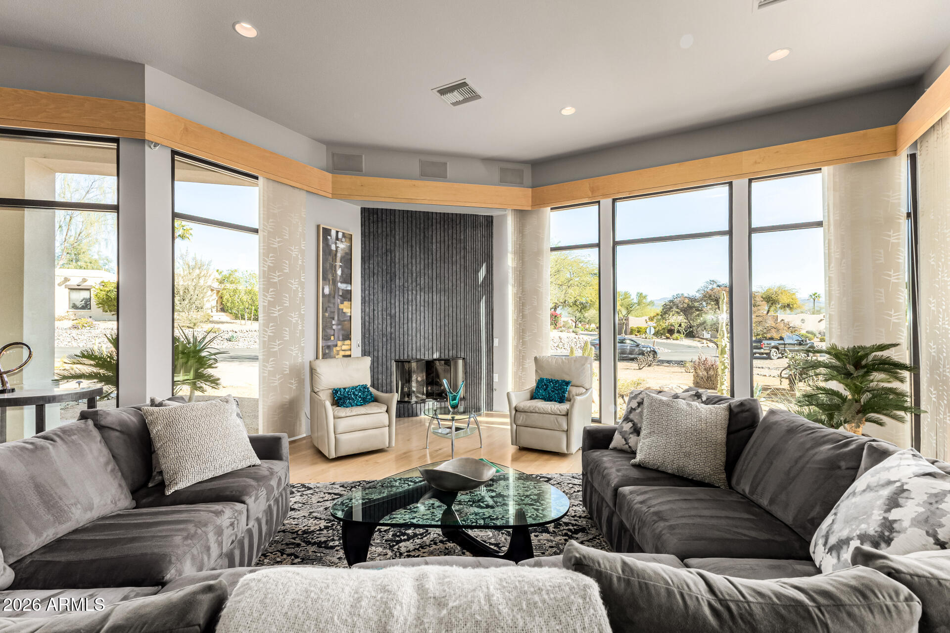 18567 East Paseo Verde Drive Rio Verde, AZ 85263 - Photo 6 of 47 a living room with furniture and large windows