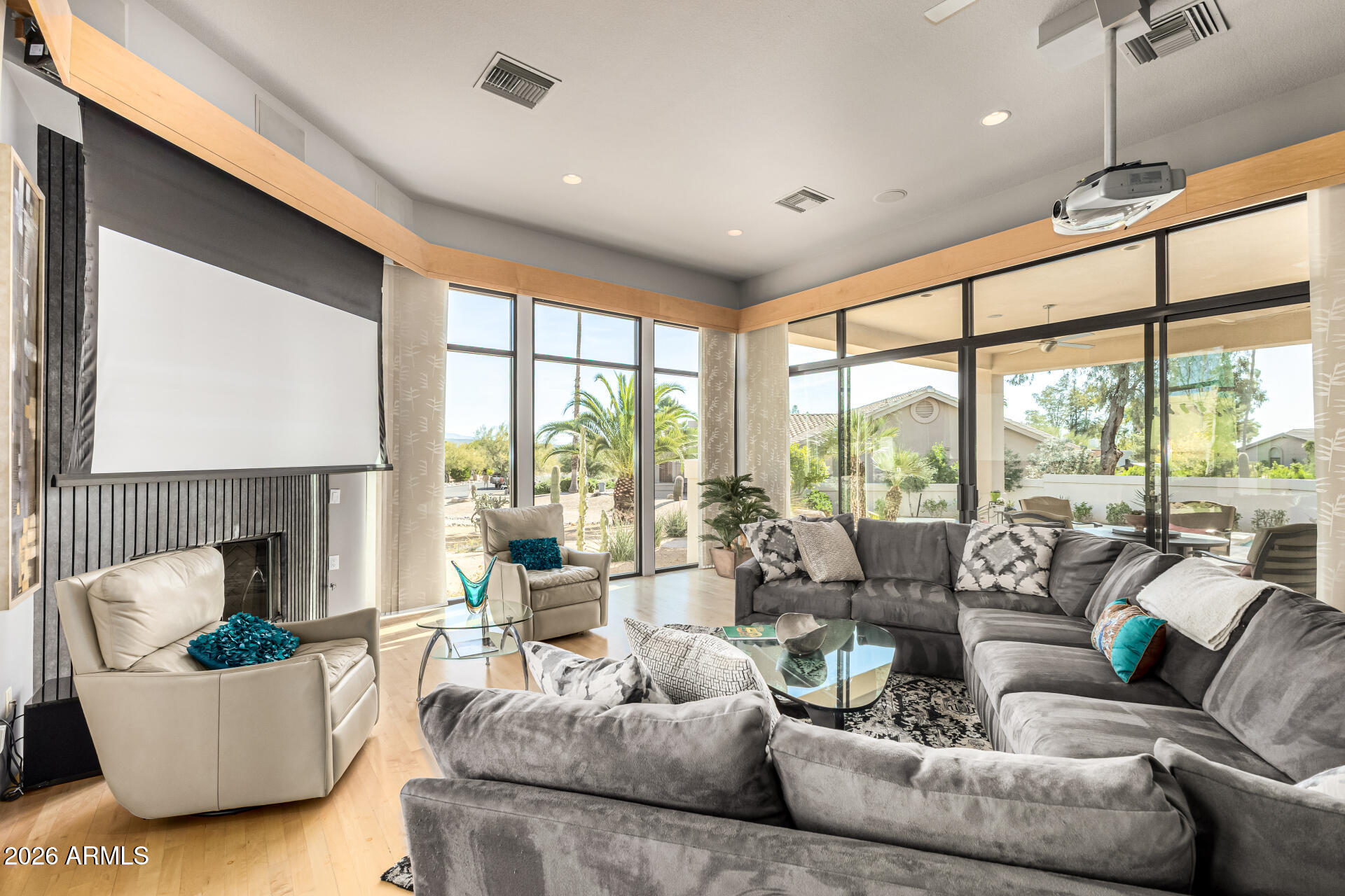 18567 East Paseo Verde Drive Rio Verde, AZ 85263 - Photo 8 of 47 a living room with furniture and a large window