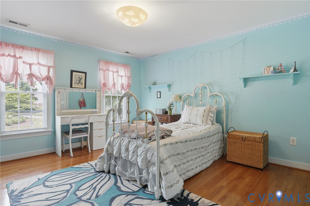 13424 Tipple Point Road Midlothian, VA 23114 - Photo 35 of 53 a bed room with a bed and a tv