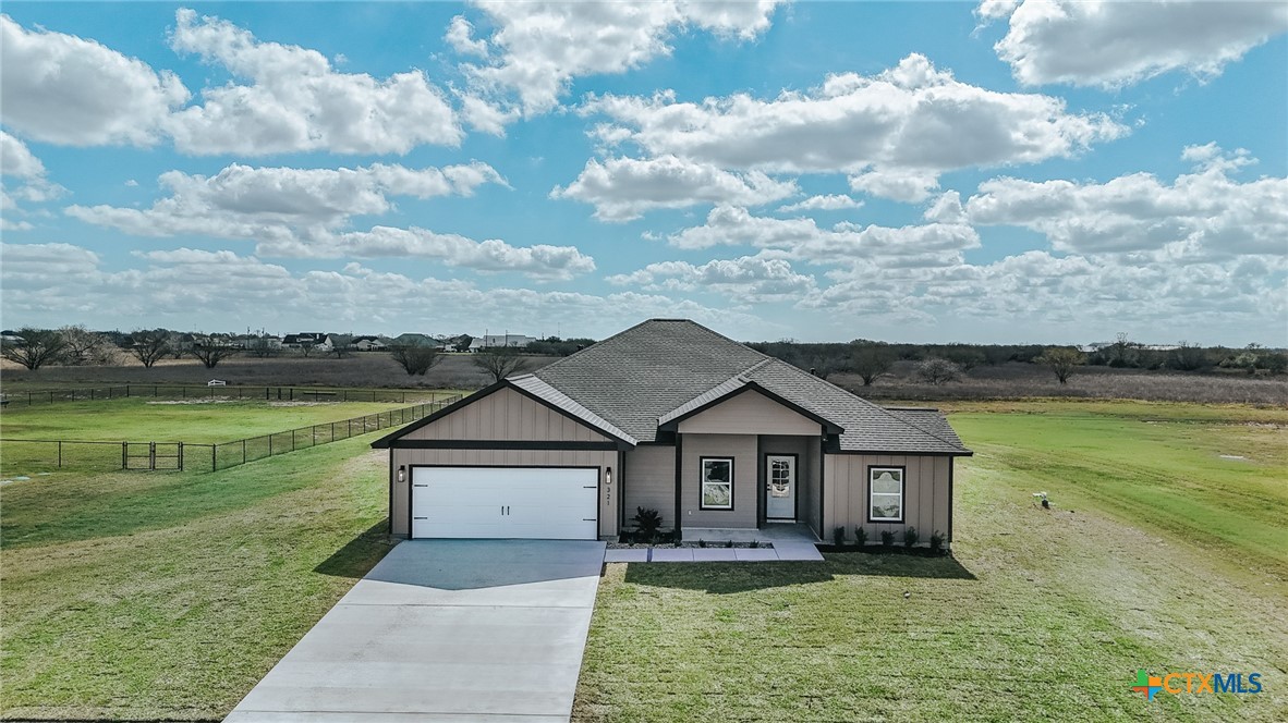 321 Whitetail Lane Victoria, TX 77905 - Photo 1 of 47 a front view of a house with garden