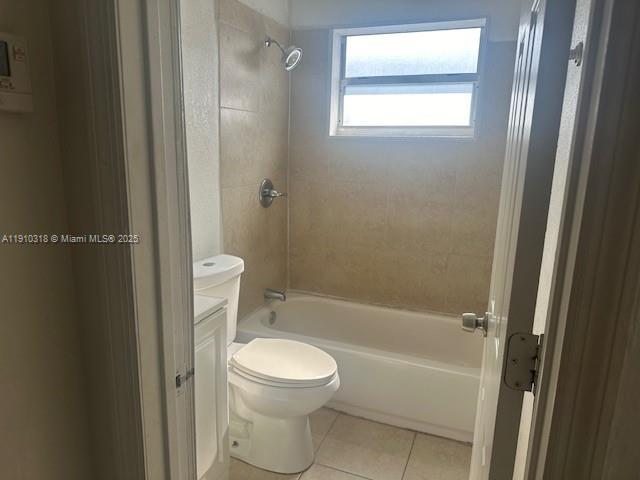 7571 Venetian Street, Unit C Miramar, FL 33023 - Photo 5 of 6 a bathroom with a toilet and a bath tub