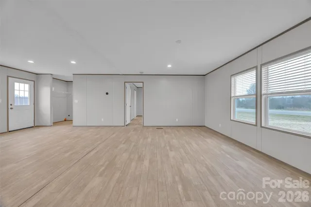 an empty room with windows